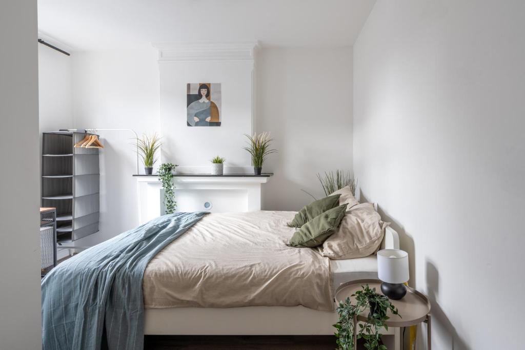 Postel nebo postele na pokoji v ubytování Penthouse Amsterdam Dam Square