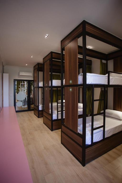 Cama o camas de una habitación en Corner Hostel