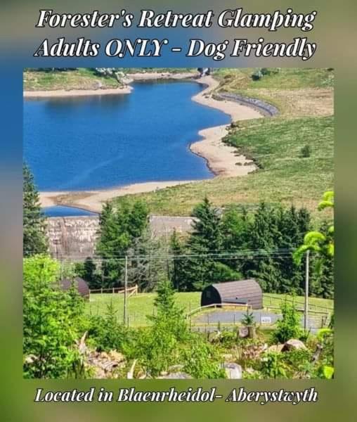 a picture of a lake with the words forestiers natural climbing adults only dogs at Forester's Retreat Glamping - Dinas View - Dogs over the age of 2 with vaccination accepted RALI CEREDIGION EVENT 4TH-6TH SEP 2026 in Aberystwyth