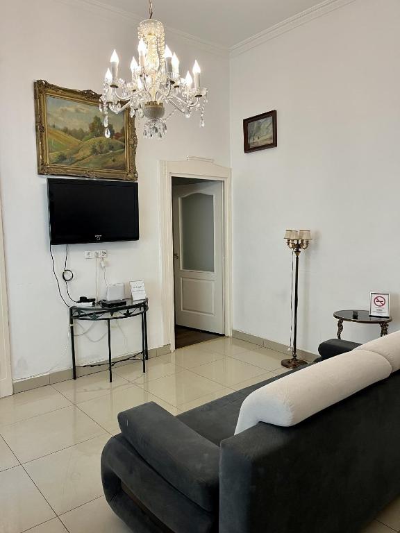 Televízia a/alebo spoločenská miestnosť v ubytovaní Budapest Diamond Flat
