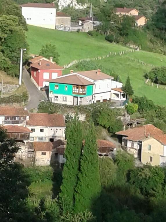 a small village on a hill with houses at Casa Rural Juaco in Bimenes