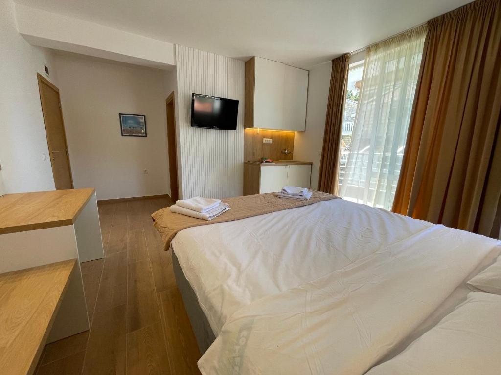 Postel nebo postele na pokoji v ubytování Guest house Villa Slavica