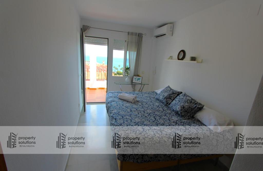 Posteľ alebo postele v izbe v ubytovaní Lomas de Mena 20 - Ático con vistas al mar - Barbacoa y Piscina- PARKING GRATIS -EXCELENTE CONEXIÓN WIFI
