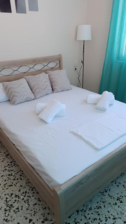 Postel nebo postele na pokoji v ubytování ARMIRA HOME