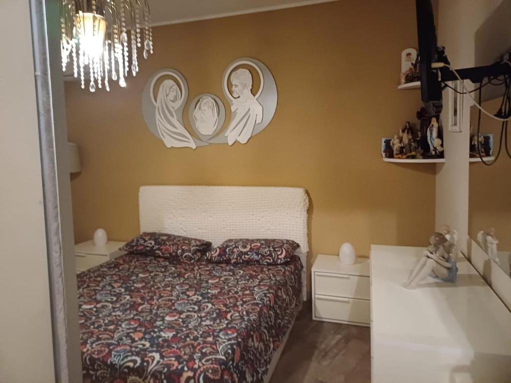 A bed or beds in a room at La casa del sole