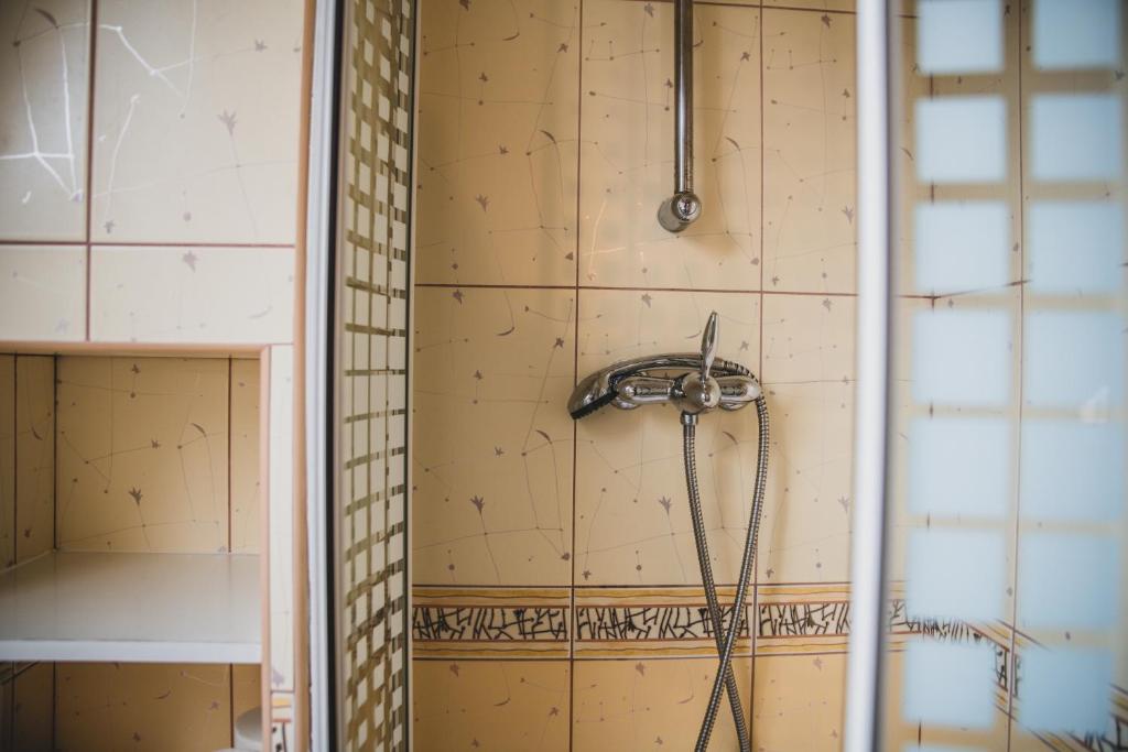 Kúpeľňa v ubytovaní Pokoje Gościnne na Stromej