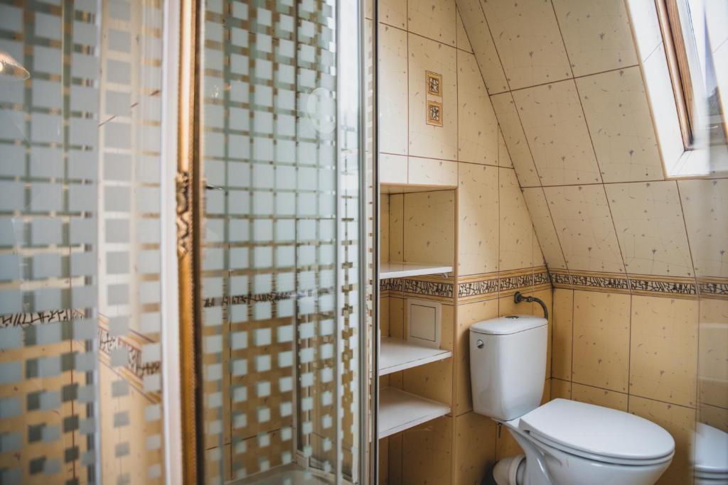 Kúpeľňa v ubytovaní Pokoje Gościnne na Stromej