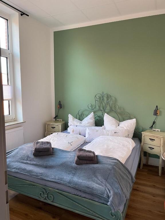 Postel nebo postele na pokoji v ubytování Aparthotel Domizil