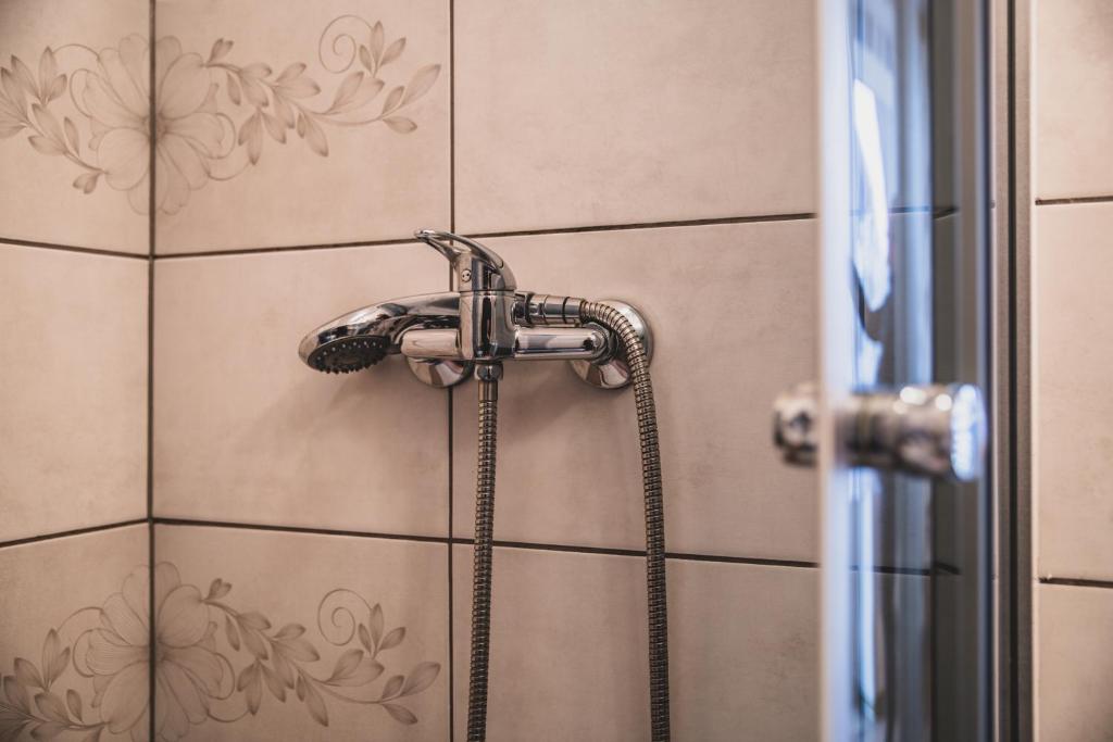 Kúpeľňa v ubytovaní Pokoje Gościnne na Stromej
