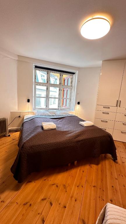 Postel nebo postele na pokoji v ubytování Fabelagtig lejlighed 2