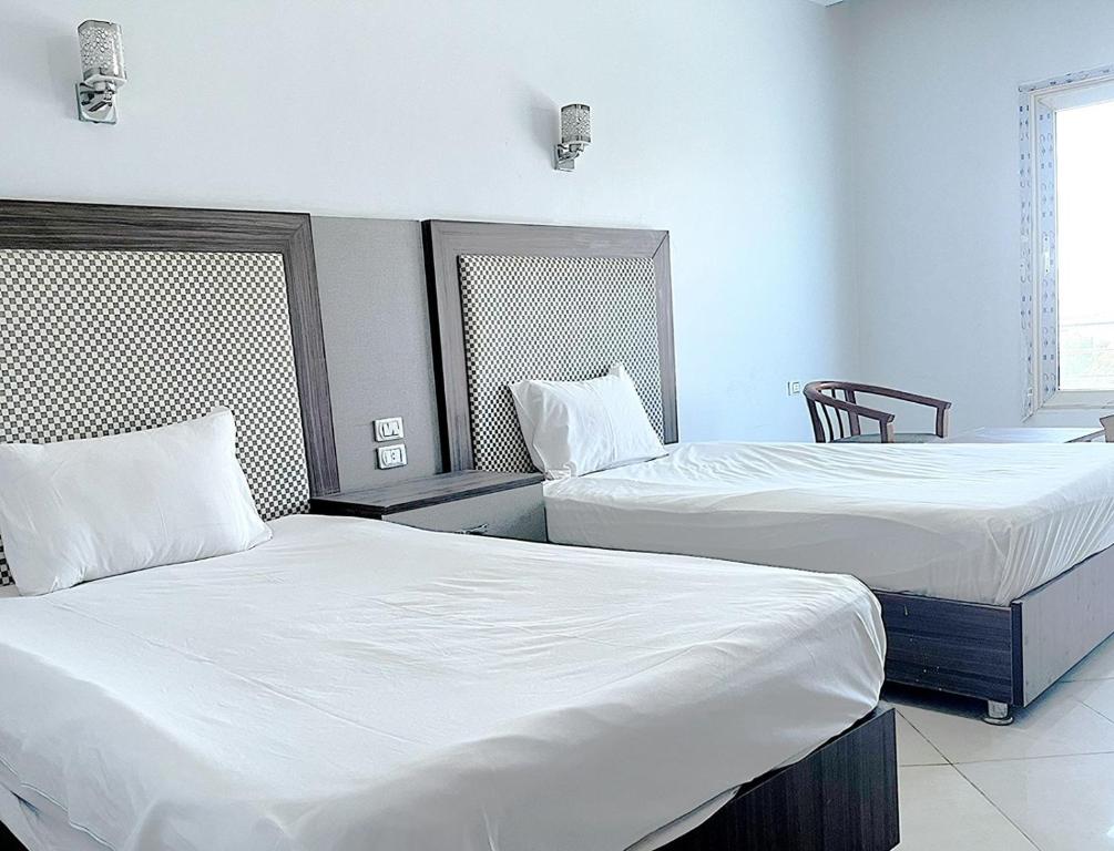Кровать или кровати в номере Cecelia Boutique Hotel Hurghada