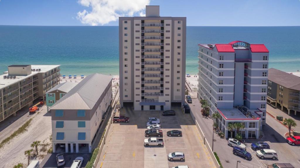an aerial view of a city with buildings and the ocean at Gulf Tower 3C by Vacation Homes Collection in Gulf Shores