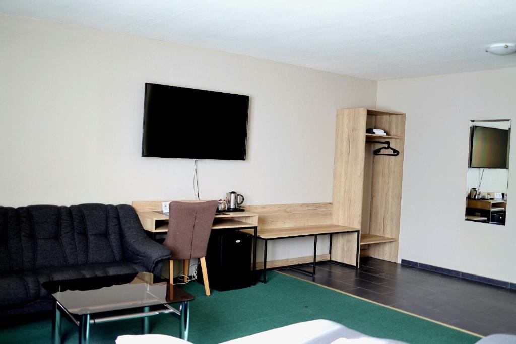 TV a/nebo společenská místnost v ubytování Hotel Hvolsvollur - Central South Iceland