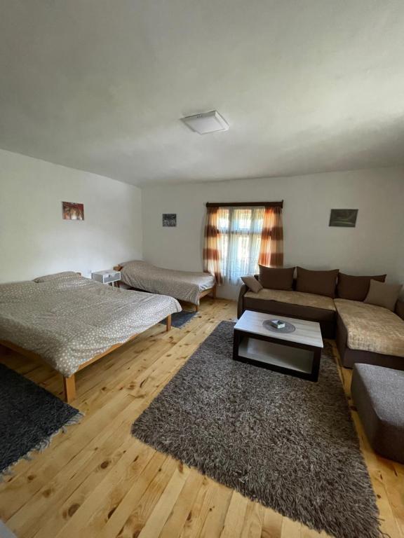 Postel nebo postele na pokoji v ubytování Apartmani Nikola Dojkinci