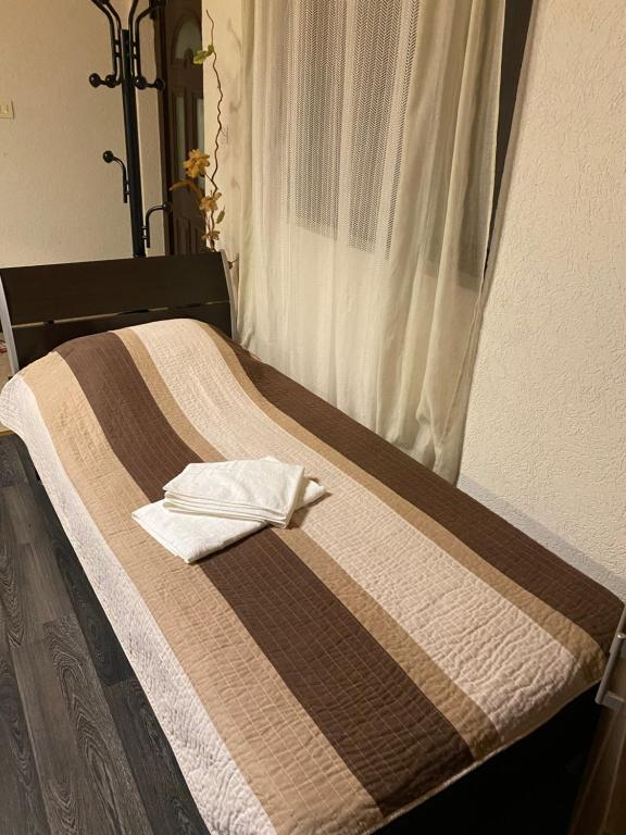 Postel nebo postele na pokoji v ubytování Apartments Arina