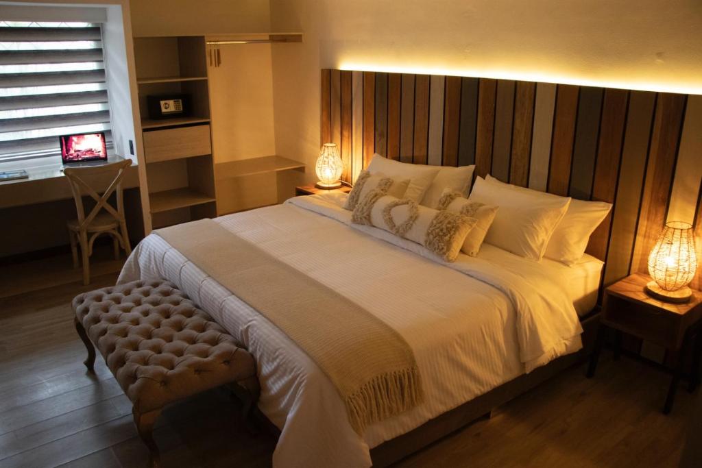 Postel nebo postele na pokoji v ubytování Marbore hotel & Spa