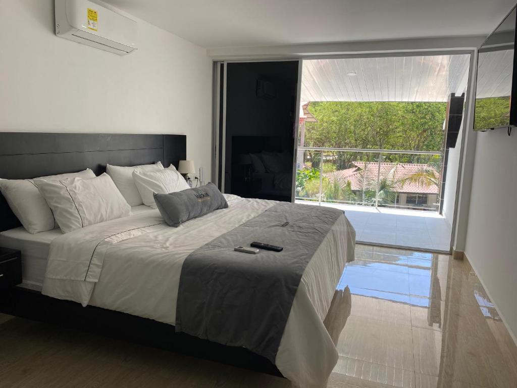 Postel nebo postele na pokoji v ubytování Malokas Resort - Socorro - San Gil