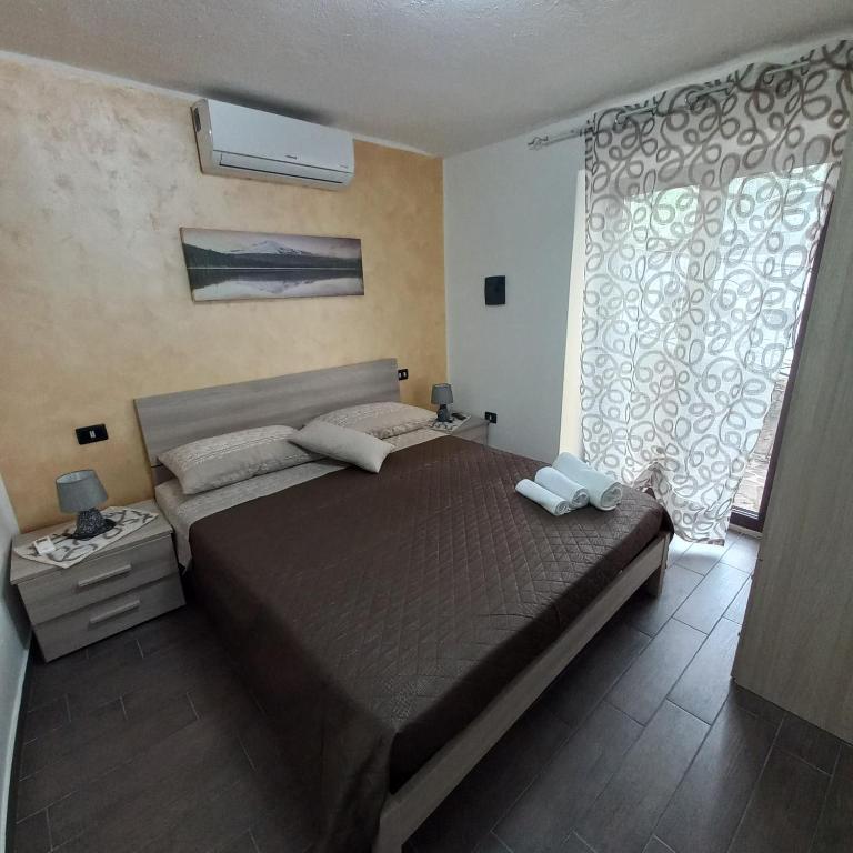 Postel nebo postele na pokoji v ubytování B&B Biancamano