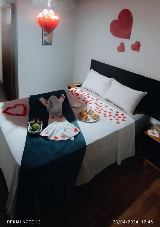 Postel nebo postele na pokoji v ubytování Pousada Estrela de Davi