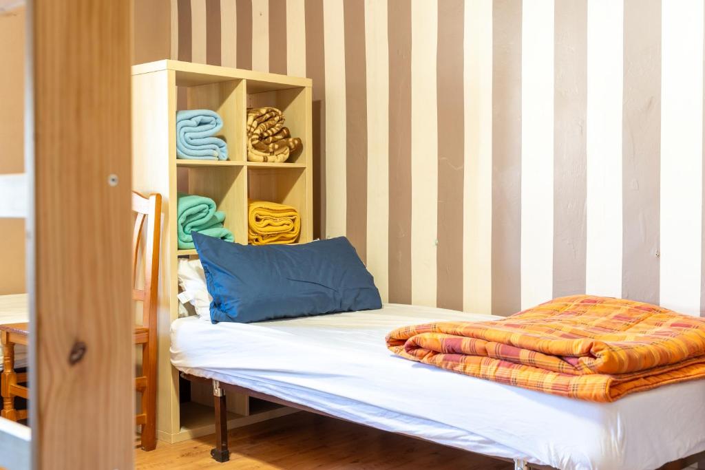 Postel nebo postele na pokoji v ubytování Hostel Atapuerca INpulso