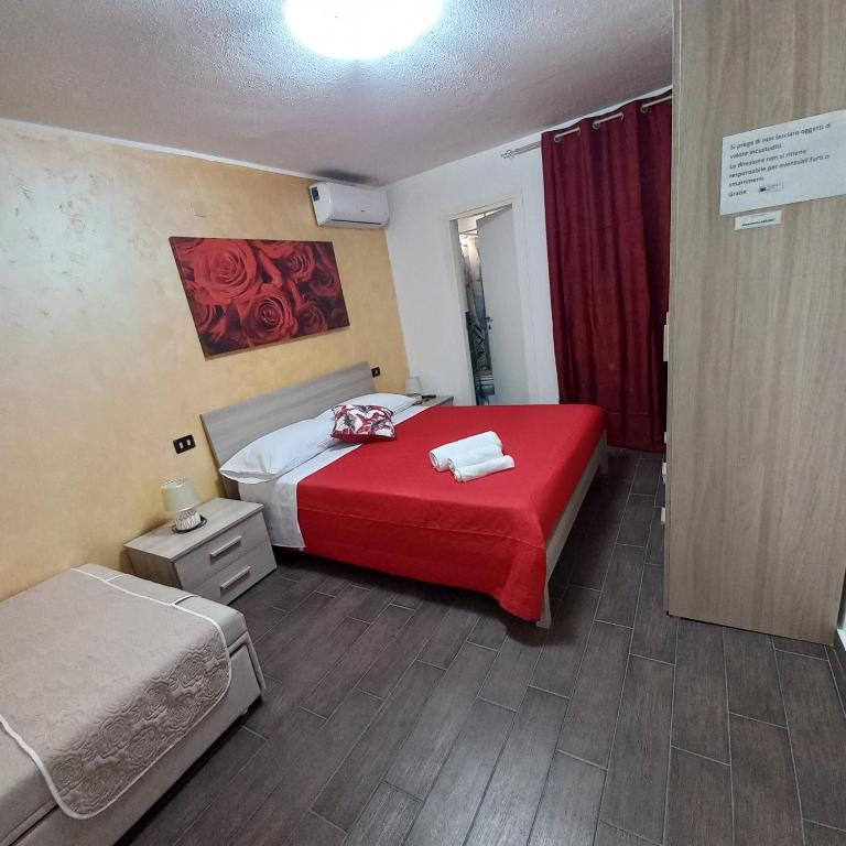 Postel nebo postele na pokoji v ubytování B&B Biancamano