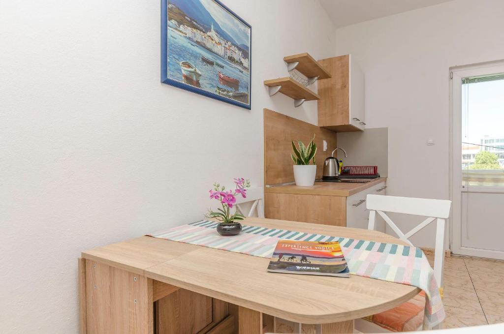 Kuchyň nebo kuchyňský kout v ubytování Apartments Sweet Escape
