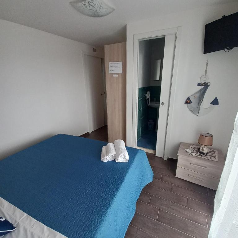 Postel nebo postele na pokoji v ubytování B&B Biancamano