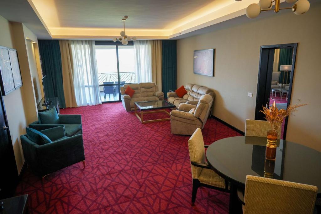 A seating area at Radisson Blu Hotel & Convention Center, Alexandria