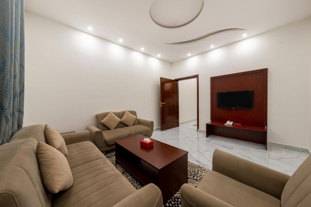TV a/nebo společenská místnost v ubytování Masharef Abha Suites