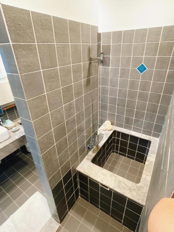 Bagno di Golden Bay Holiday Inn