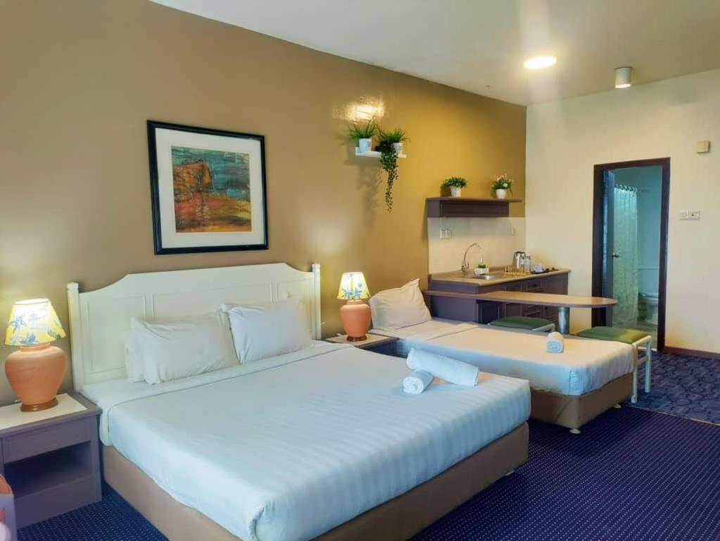מיטה או מיטות בחדר ב-17 Jazz sweet beachfront resort