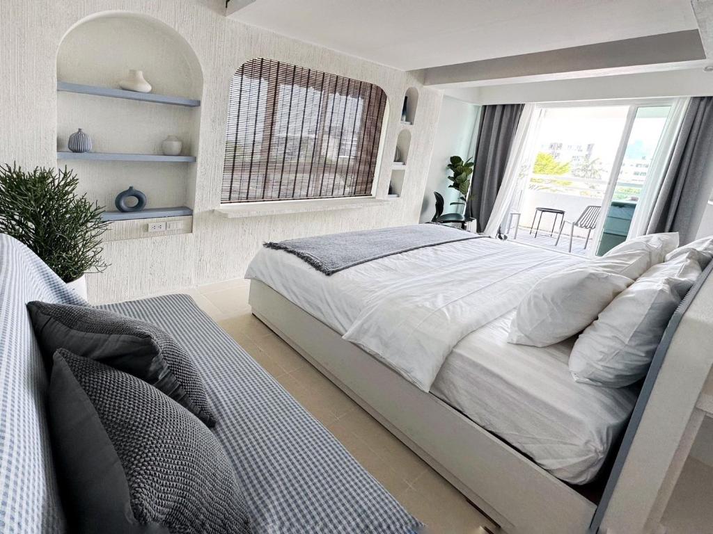 Katil atau katil-katil dalam bilik di UDMS On Nut 10 - Bangkok's Charm 40 sqm