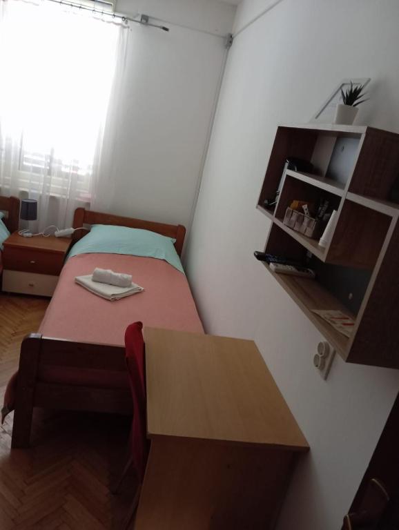 Postel nebo postele na pokoji v ubytování Jasna1