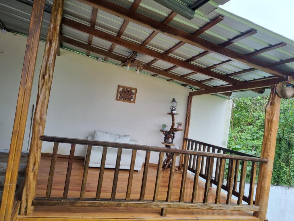 a wooden staircase in a house with a wooden ceiling at Rancho Mi Cielo 