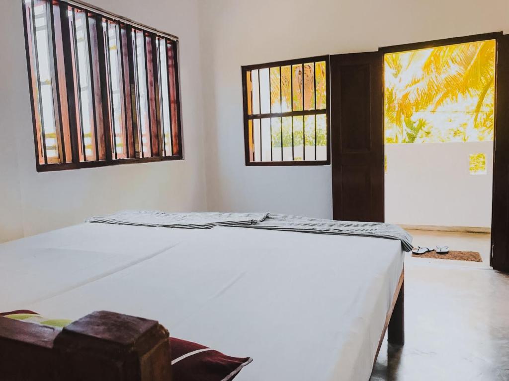 Postel nebo postele na pokoji v ubytování Summer lodge-Tangalle
