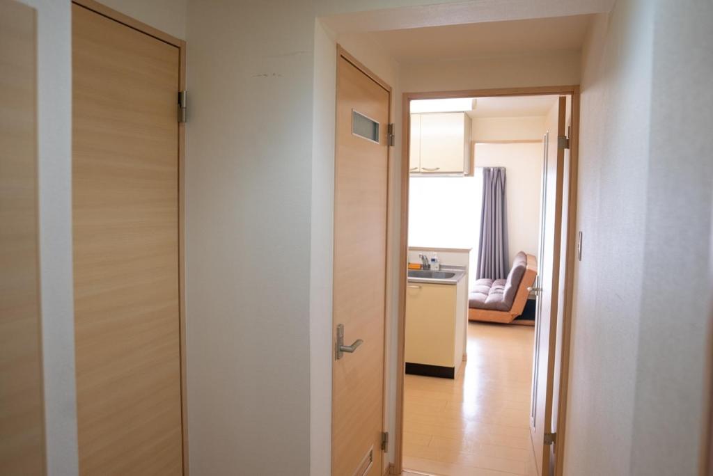 Postel nebo postele na pokoji v ubytování apartment hotel myu