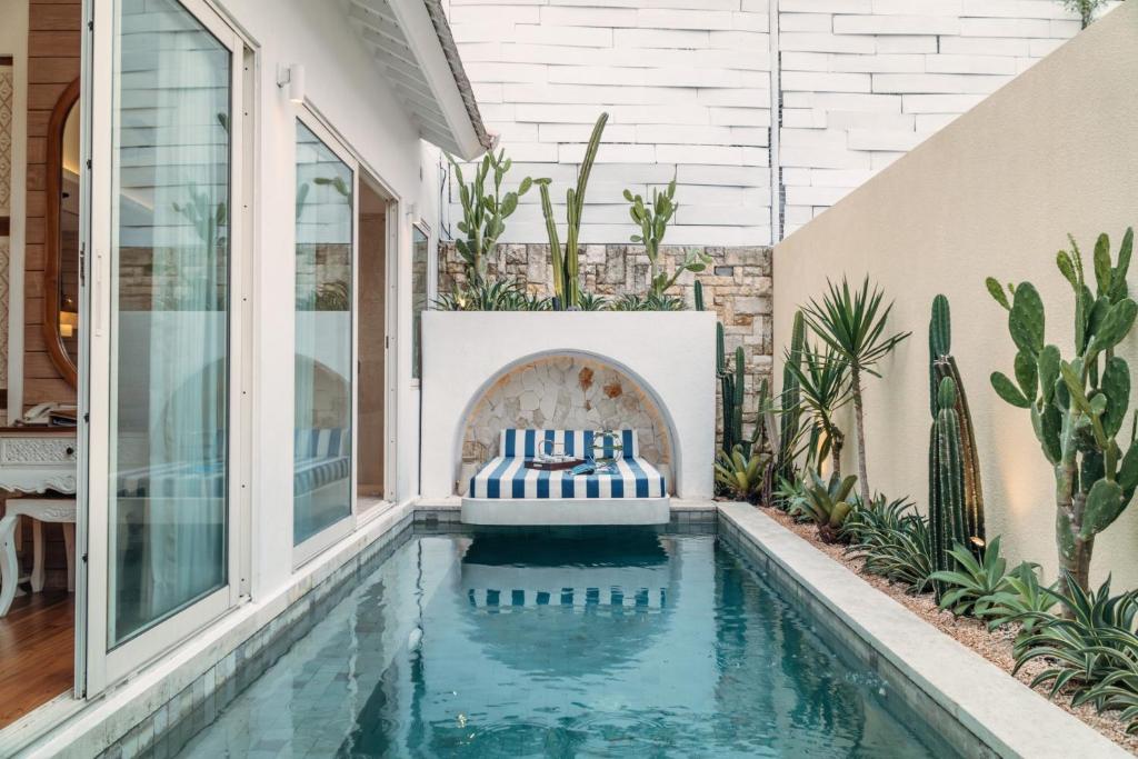 The swimming pool at or close to Aleva Villa Seminyak by Ini Vie Hospitality