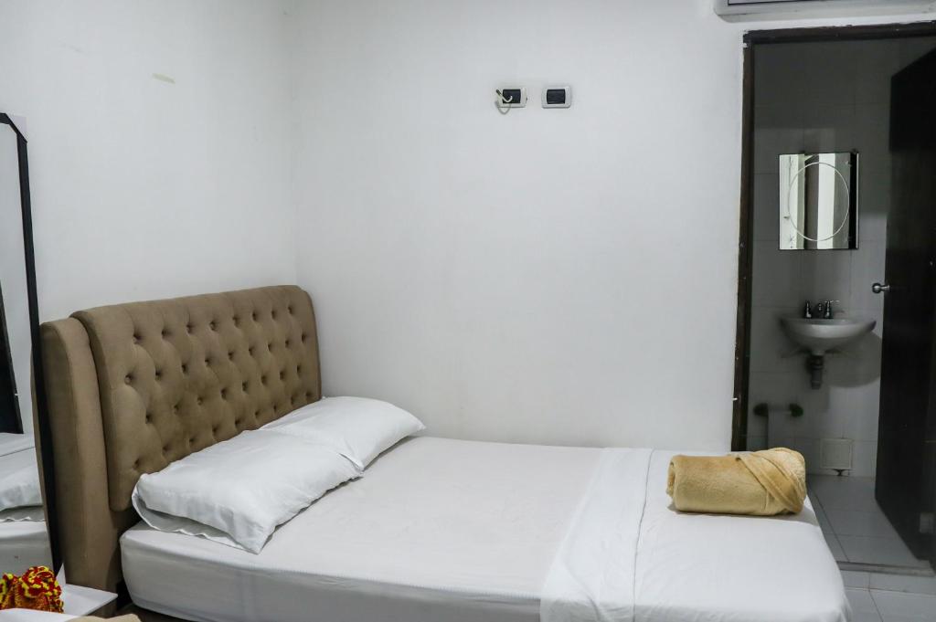 Letto o letti in una camera di Guajira Sunset Hostal