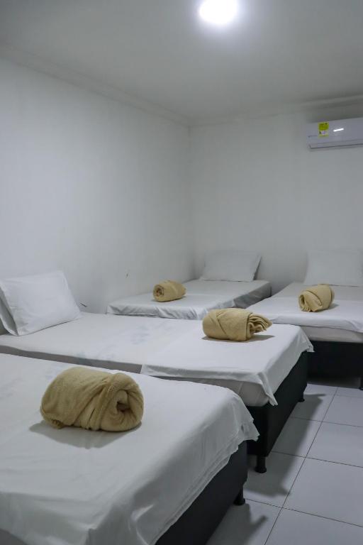 Letto o letti in una camera di Guajira Sunset Hostal