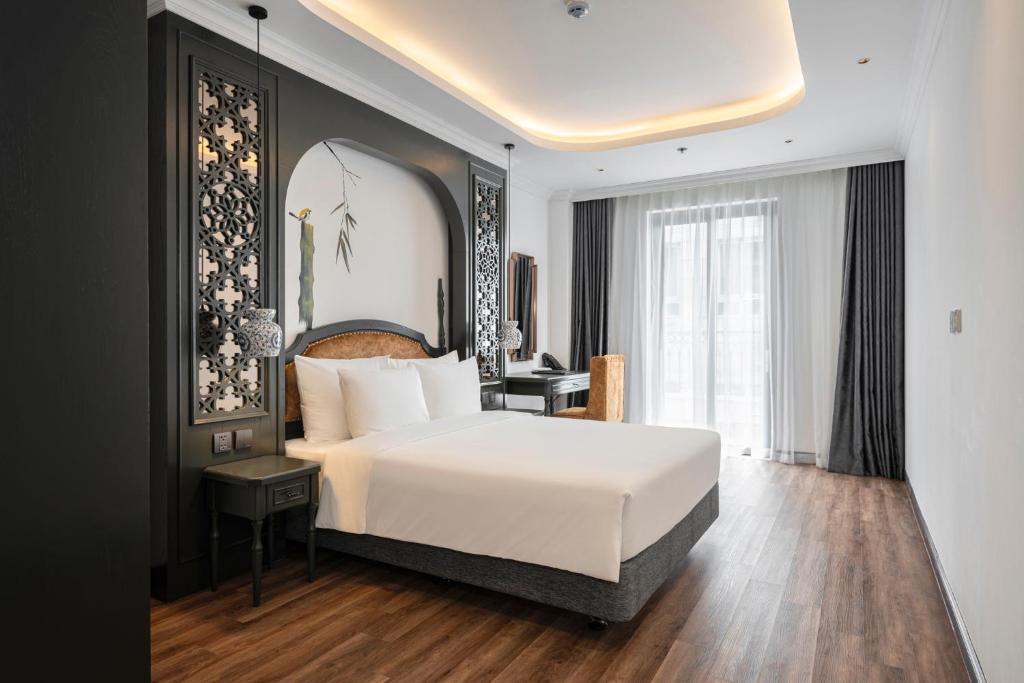 Giường trong phòng chung tại Eli Rina Hotel