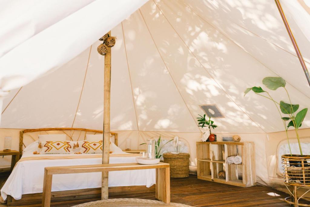 Postel nebo postele na pokoji v ubytování Parada Beach Camp