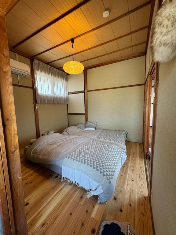 Krevet ili kreveti na kat u jedinici u objektu 敷島旅館