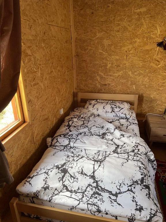 Postel nebo postele na pokoji v ubytování Etno meandri Uvca