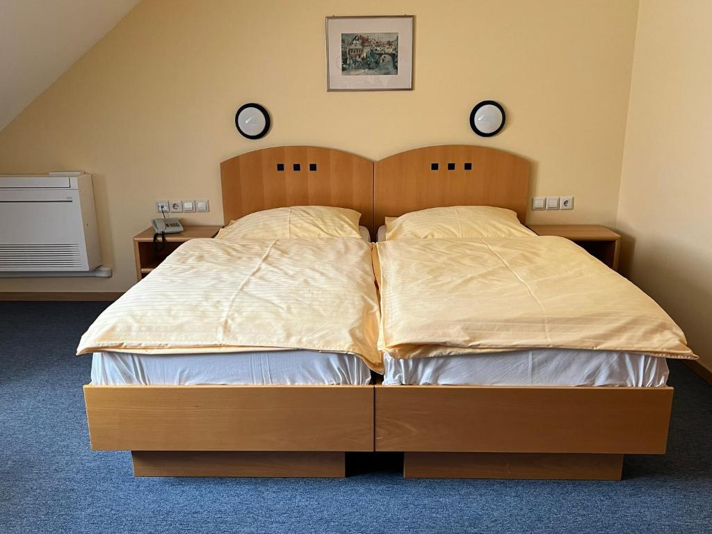 Postel nebo postele na pokoji v ubytování Mini Hotel