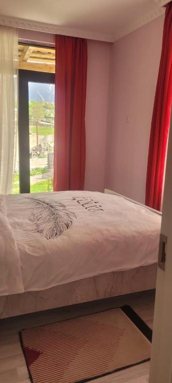 Postel nebo postele na pokoji v ubytování Guest House Guli