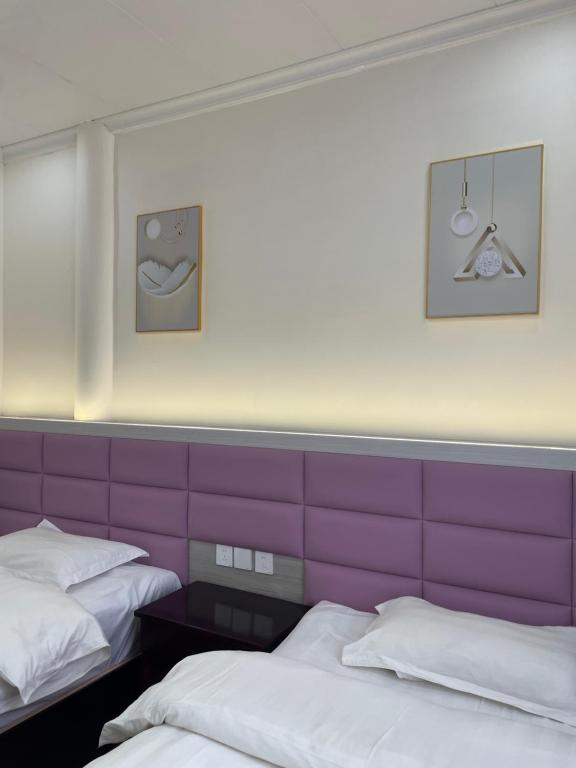 Postel nebo postele na pokoji v ubytování Youranju Guesthouse