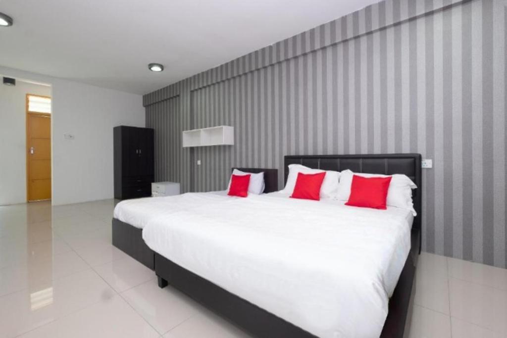 Postel nebo postele na pokoji v ubytování Summer Hotel