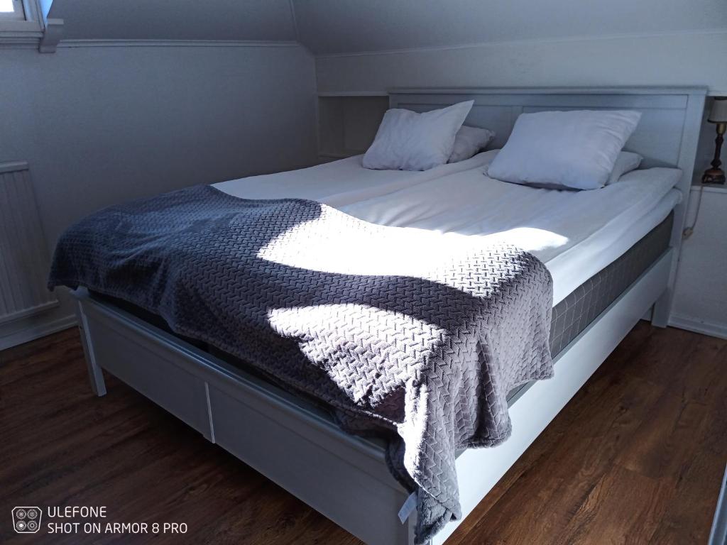 Postel nebo postele na pokoji v ubytování Hotell Viking