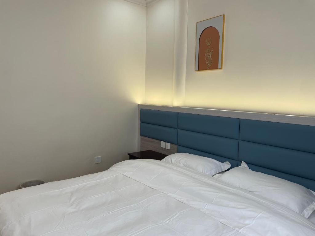 Postel nebo postele na pokoji v ubytování Youranju Guesthouse