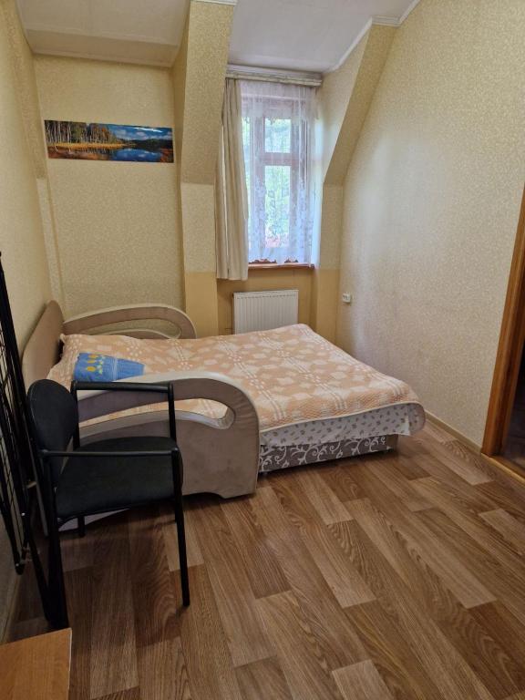 Postel nebo postele na pokoji v ubytování Nautilus